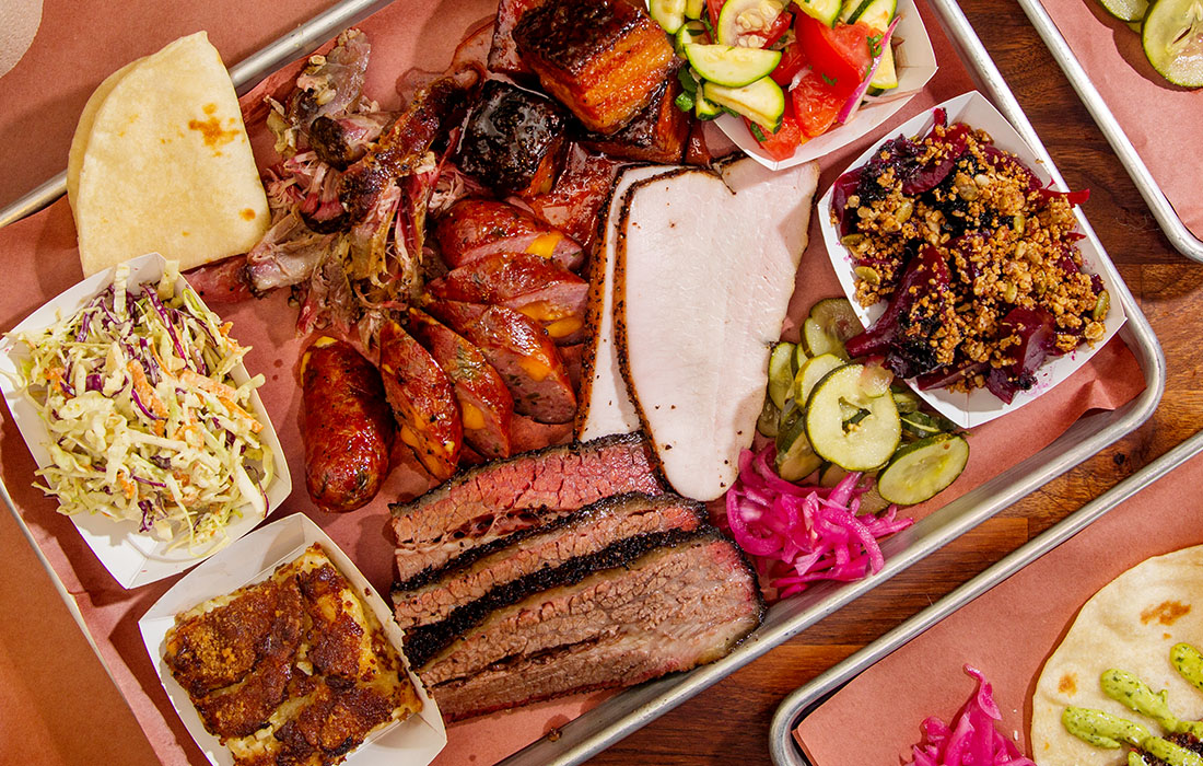 InterStellar BBQ signature dishes Prime Brisket, Duroc Pulled Pork Shoulder, Gangster of Love.